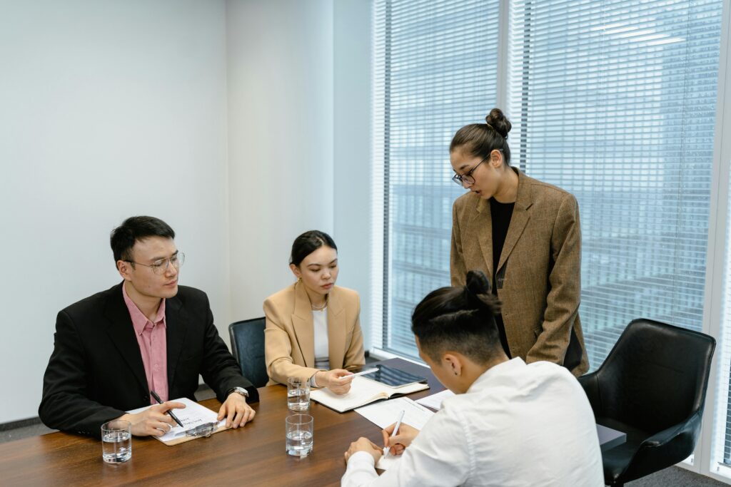 Employees in the middle of a meeting.